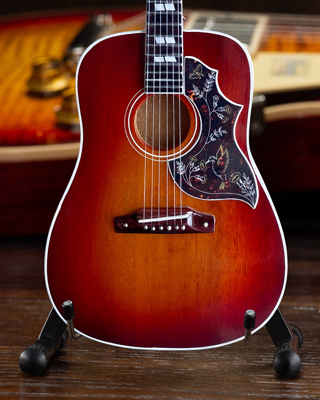 Mini guitarra Gibson Hummingbird Vintage Cherry a escala 1:4 
