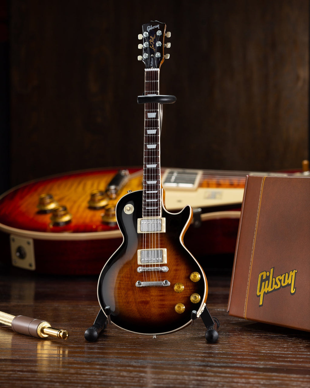 Mini guitarra Gibson Les Paul Traditional Tobacco Burst a escala 1:4 