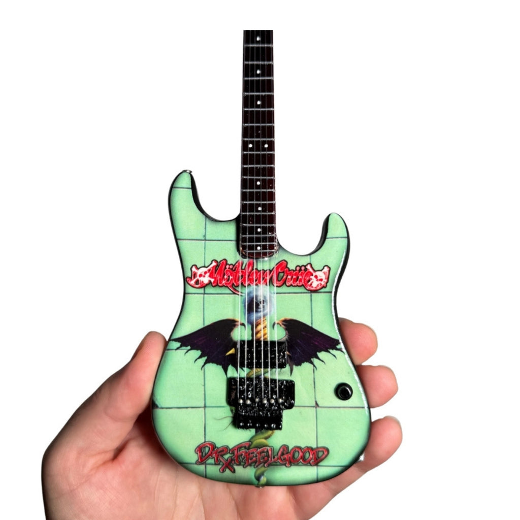 MOTLEY CRUE - SET OF 4 MINI GUITARS