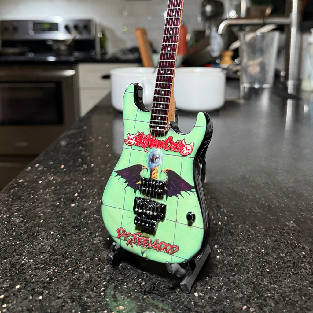 MOTLEY CRUE - SET OF 4 MINI GUITARS