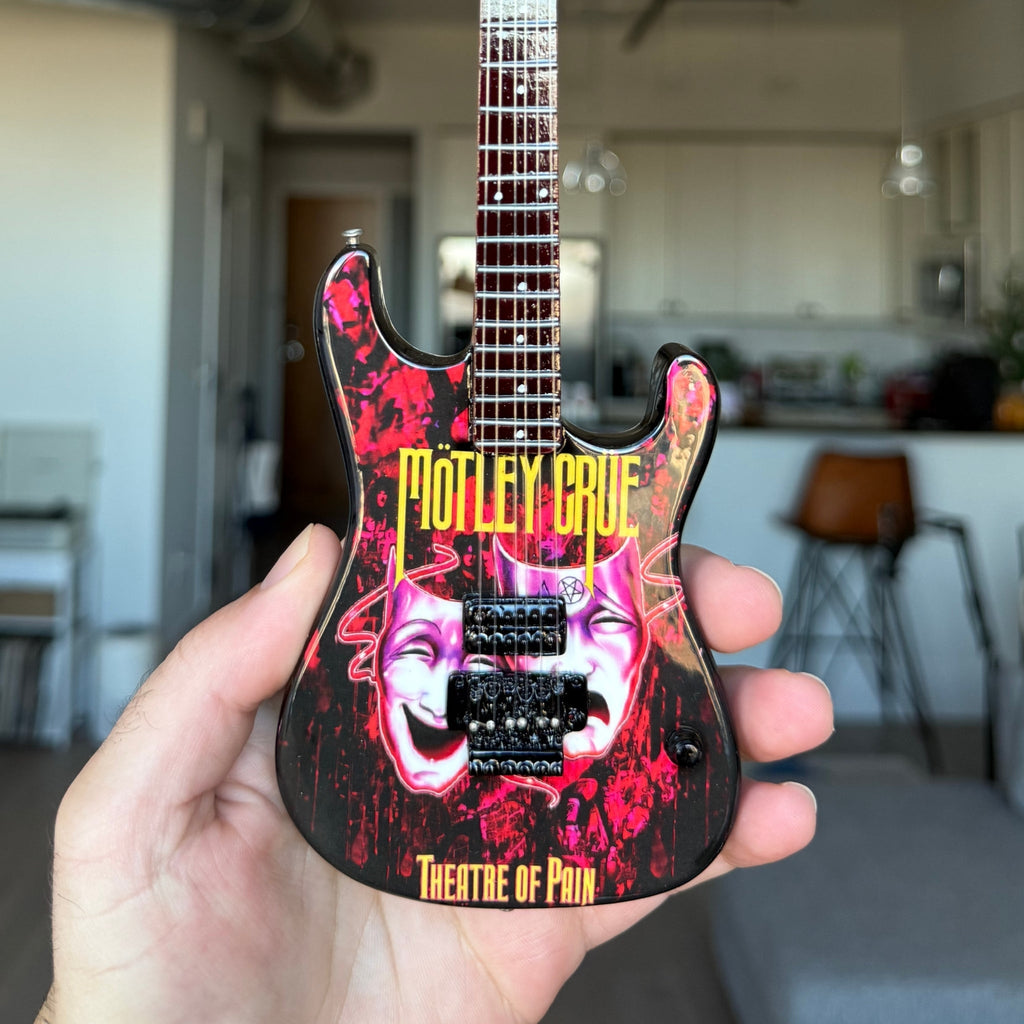 MOTLEY CRUE - SET OF 4 MINI GUITARS