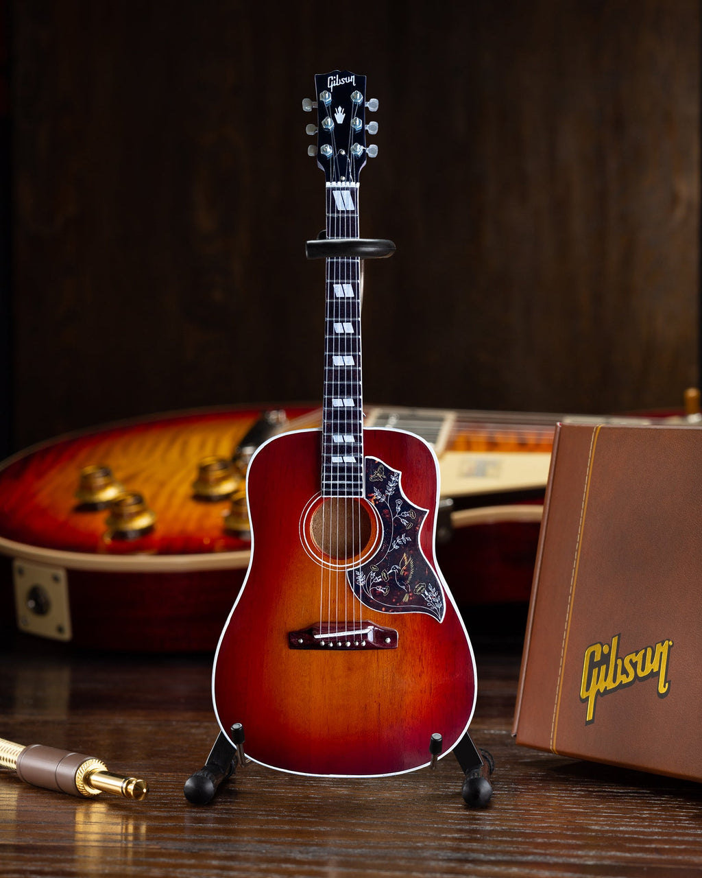 Mini guitarra Gibson Hummingbird Vintage Cherry a escala 1:4 