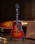 Mini guitarra Gibson Hummingbird Vintage Cherry a escala 1:4 