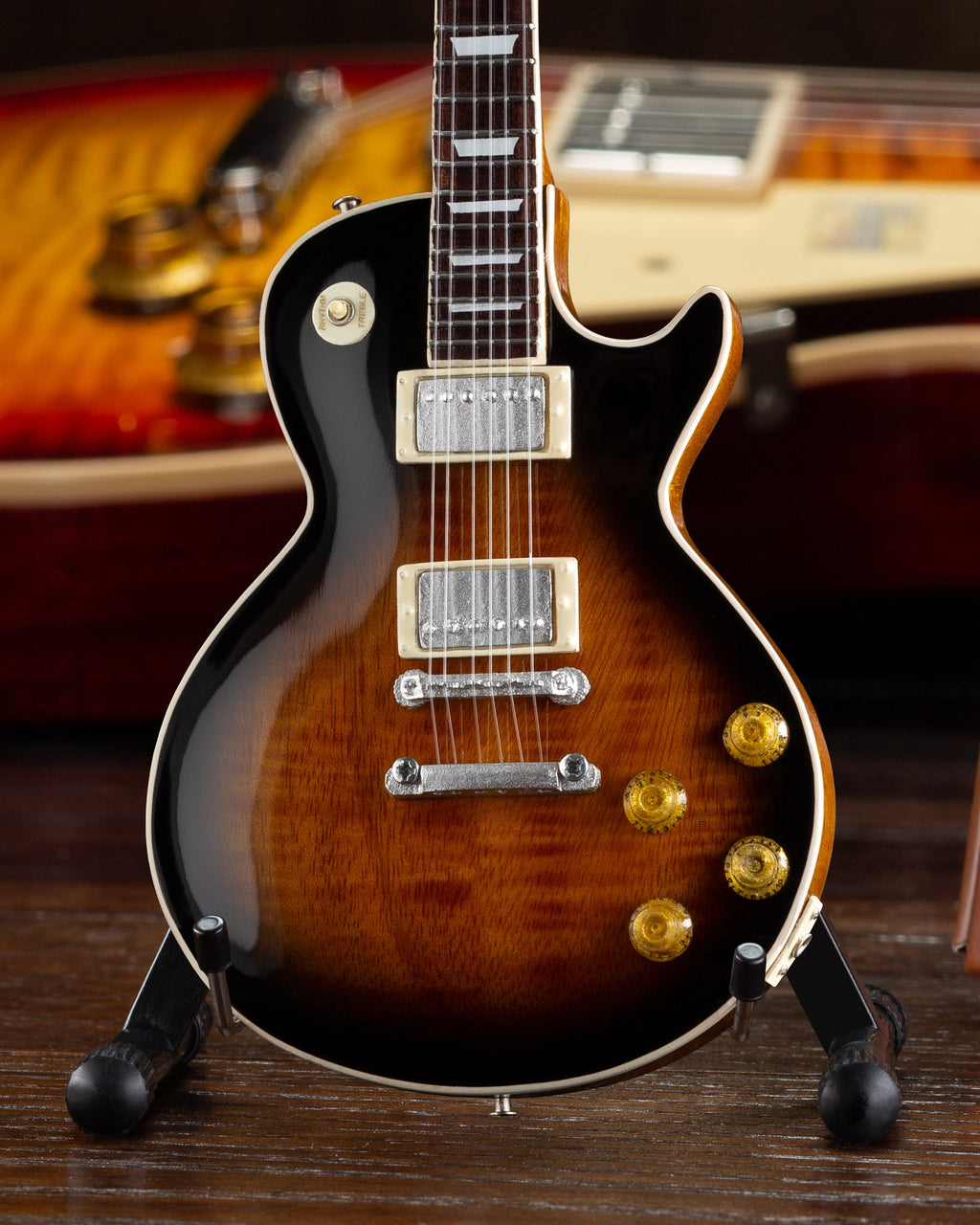 Mini guitarra Gibson Les Paul Traditional Tobacco Burst a escala 1:4 